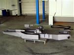 Cogeim Continuous feed  pass-through  hanging load type shot blasting machine - GTU Series Shotblasting Machines 